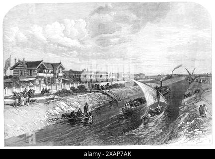 Isthmus von Suez Maritime Canal: Ismailia und Süßwasserkanal, [Ägypten], 1869. Eine Skizze von unserem Spezialkünstler vom Süßwasserkanal in Ismailia, mit den Häusern des ägyptischen Gouverneurs, von M. Ferdinand de Lesseps, dem Manager und Präsidenten der Suez Canal Company, und von M. Voisin oder Voisin Bey, dem Ingenieur, der angenehm an seiner Bank gelegen ist. Das Chalet von M. de Lesseps befindet sich auf der linken Seite; das nächste Haus mit orientalischen Bögen ist das seines Chefingenieurs; und der Gouverneur von Ismailia residiert in dem Herrenhaus dahinter. Diese Wohnungen haben einen angenehmen Blick über den Ti-See Stockfoto