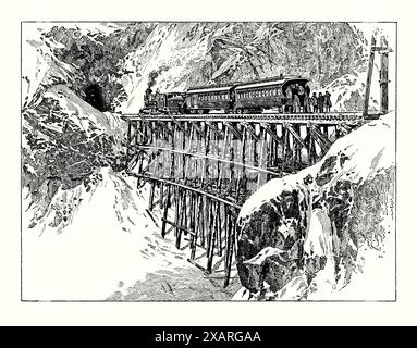 Eine alte Gravur des ersten Zuges, der 1899 auf dem White Pass und der Yukon Route (WP&Y oder WP&YR) zum White Pass fuhr. Es stammt aus einem viktorianischen Geschichtsbuch aus dem jahr 1900. Die Eisenbahn ist eine 914 mm (3 ft) lange Schmalspurbahn zwischen dem Hafen von Skagway, Alaska, USA und Whitehorse, der Hauptstadt von Yukon, Kanada. Es handelt sich um ein isoliertes System, das keine direkte Verbindung zu einer anderen Leitung hat. Die Eisenbahn begann 1898 während des Klondike Gold Rush mit dem Bau, um die Goldfelder schnell zu erreichen. Mit seiner Fertigstellung im Jahr 1900 wurde er die primäre Route ins Innere des Yukon. Stockfoto