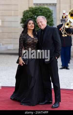 Die US-mexikanische Schauspielerin Salma Hayek und ihr Ehemann Francois-Henri Pinault kamen am 8. Juni 2024 im Elysee Palace in Paris zu einem offiziellen Staatsessen zusammen. Foto: Raphael Lafargue/ABACAPRESS. KOM Stockfoto