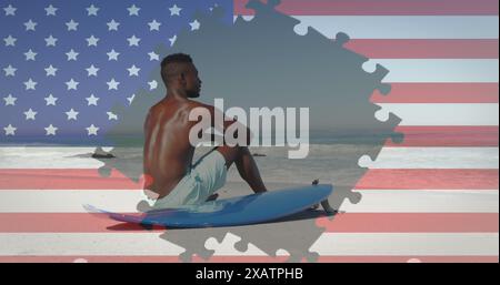 Bild eines Feuerwerks und Puzzles mit amerikanischer Flagge, die einen Mann am Strand enthüllen Stockfoto