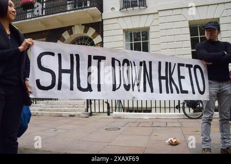 London, Großbritannien. Juni 2024. Demonstranten versammelten sich vor dem Hong Kong Economic and Trade Office (HKETO) in Zentral-London am fünften Jahrestag des Beginns der Proteste in Hongkong 2019 und forderten Großbritannien auf, HKETO zu schließen und diplomatische Privilegien aufzuheben. Quelle: Vuk Valcic/Alamy Live News Stockfoto