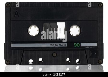 Schwarzes Audiokassettenband mit grünem Etikett. Stockfoto