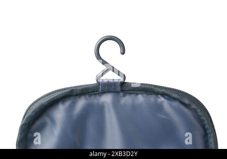 Nahaufnahme von Kunststoffbügel zum Aufhängen von Tasche oder Tasche isolierter weißer Hintergrund, Haken in tragbaren Reisetoiletten, Kosmetik- oder Waschtaschen Stockfoto
