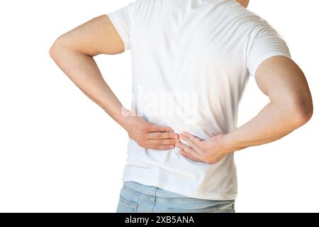 Rückansicht eines hübschen, attraktiven jungen Mannes, der seinen Rücken vor Schmerzen hält, isoliert auf weißem Hintergrund, junger Mann mit Schmerzen im unteren Rücken Stockfoto