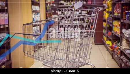 Leerer Warenkorb im Gang des Lebensmittelgeschäfts Stockfoto