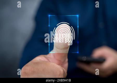 Biometrisches Cybersicherheitssystem und Zugangskontrollkonzept. Geschäftsmann greift auf persönliche Finanzdaten über Scan-Fingerabdruck-Identifikation zu. Stockfoto