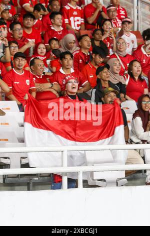 Jakarta, Indonesien, 11. Juni 2024 Indonesien Unterstützer bei der Qualifikation zur FIFA-Weltmeisterschaft 2026 (AFC) Indonesien gegen die Philippinen und 2027 AFC-Qualifikation für den Asiencup im Stadion Utama Gelora Bung Karno am 11. Juni 2024 in Jakarta Indonesien, Credit Shaquille Fabri/Alamy Live News Stockfoto