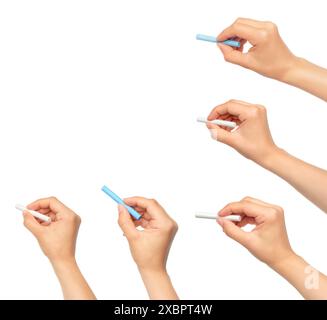 Eine Reihe von Frauenhänden, die eine Kreide halten, isoliert auf weißem Hintergrund Stockfoto