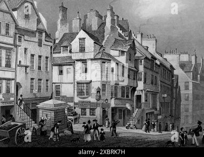 John Knox’s House, High Street, Edinburgh, Stich von T. Barber. Es stammt von einem Stich aus dem Jahr 1832, der aus einer Aquarellzeichnung von Thomas H. Shepherd (1793–1864) stammt. Zu der Zeit, 1832, war Wilhelm IV. König, etwa fünf Jahre bevor Königin Victoria den Thron bestieg. Dies und andere, die ich in der Serie habe, wurden verwendet, um die architektonischen Ähnlichkeiten zwischen Athen und Edinburgh (Schottland) und seiner Umgebung zu dieser Zeit zu veranschaulichen. Hinweis: Einige der Originale hatten Foxing, was auf den Fotos als etwas dunklere Flecken erscheinen kann. Stockfoto