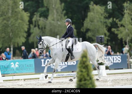 Laura Birley aus Großbritannien mit Bob Cotton Bandit während der CCI5* Dressur bei den Longines Luhmuhlen Horse Trials am 14. Juni 2024, Luhmuhlen, Deutschland (Foto: Maxime David - MXIMD Pictures) Stockfoto