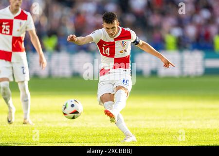 Berlin, Deutschland. Juni 2024. Ivan Perisic (14) aus Kroatien war beim Spiel der UEFA Euro 2024 in der Gruppe B zwischen Spanien und Kroatien im Olympiastadion in Berlin zu sehen. Quelle: Gonzales Photo/Alamy Live News Stockfoto