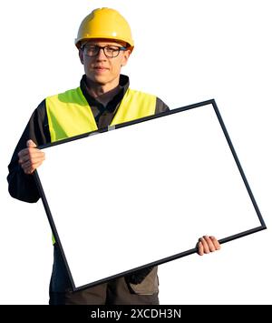 Arbeiter im Helm mit leerem Whiteboard. Leer, können Sie Ihren Text hier hinzufügen. Stockfoto