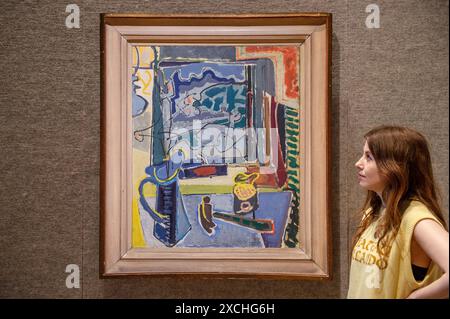 London, England, Großbritannien. Juni 2024. Bonhams-Mitarbeiter steht von Patrick Heron (British, 1920-1999) The Langdale Pikes, Dämmerung: 1949-50, 76,2 x 63,5 cm 30, geschätzt auf GBP 200.000 - GBP 300.000, während des Fotorufs für den Modern British Art Sale in Bonhams London. (Kreditbild: © Thomas Krych/ZUMA Press Wire) NUR REDAKTIONELLE VERWENDUNG! Nicht für kommerzielle ZWECKE! Stockfoto