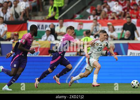 Stuttgart, Deutschland. Juni 2024. Roland Sallai (Ungarn)Joshua Kimmich (Deutschland)Antonio Rudiger (Deutschland) bei der UEFA Euro Deutschland 2024 Spiel dazwischen Deutschland 2-0 Ungarn in der Stuttgart Arena am 19. Juni 2024 in Stuttgart. (Foto: Maurizio Borsari/AFLO) Credit: Aflo Co. Ltd./Alamy Live News Stockfoto