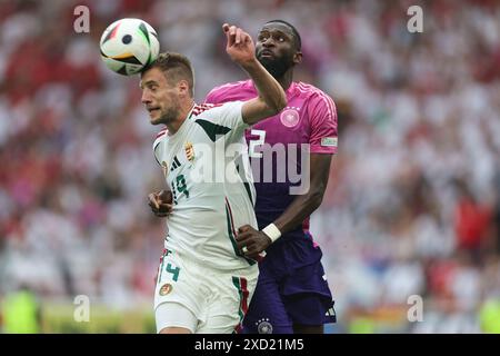 Stuttgart, Deutschland. Juni 2024. Barnabas Varga (Ungarn)Antonio Rudiger (Deutschland) bei der UEFA Euro Deutschland 2024 Spiel dazwischen Deutschland 2-0 Ungarn in der Stuttgart Arena am 19. Juni 2024 in Stuttgart. (Foto: Maurizio Borsari/AFLO) Credit: Aflo Co. Ltd./Alamy Live News Stockfoto