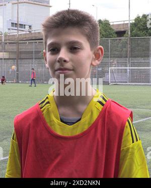 Screengrab aus PA Video von Nikita, 13, aus Kiew, Ukraine, der Mitglied des Bloomsbury Football's Refugee and Asylum Seeker Programme in London ist. Im Rahmen der kostenlosen Initiative werden Fußballsitzungen und Unterstützung für Flüchtlinge und Asylbewerber zwischen 11 und 18 Jahren aus Ländern wie der Ukraine und Afghanistan angeboten. Ausgabedatum: Donnerstag, 20. Juni 2024. Stockfoto