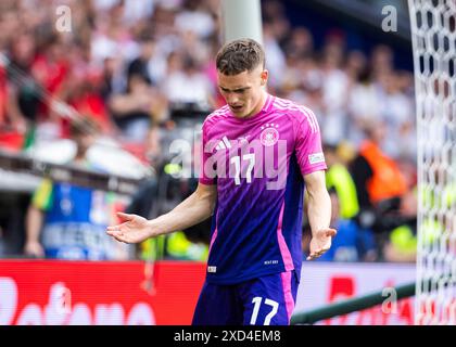 Stuttgart, Deutschland. Juni 2024. Stuttgart, MHP Arena, 19.06.2024: Florian Wirtz reagiert während des Spiels UEFA-Europameisterschaft 2024 Deutschland gegen Ungarn. Quelle: Mika Volkmann/Alamy Live News Stockfoto