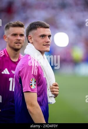 Stuttgart, Deutschland. Juni 2024. Stuttgart, MHP Arena, 19.06.2024: Florian Wirtz aus deutschland lächelt nach dem Spiel UEFA-Europameisterschaft 2024 Deutschland gegen Ungarn. Quelle: Mika Volkmann/Alamy Live News Stockfoto
