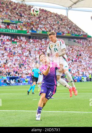 Stuttgart, Deutschland. Juni 2024. Bendeguz Bolla, HUN 14 wetteifern um den Ball, Tackling, Duell, Header, zweikampf, Aktion, Kampf gegen Florian Wirtz, Nr. 17 DFB im Gruppenspiel DEUTSCHLAND - UNGARN 2-0 der UEFA-Europameisterschaften 2024 am 19. Juni 2024 in Stuttgart. Fotograf: ddp Images/STAR-Images Credit: ddp Media GmbH/Alamy Live News Stockfoto