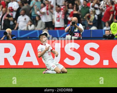 Berlin, Deutschland. Juni 2024. Krzysztof Piatek feiert beim Gruppenspiel der UEFA Euro 2024 zwischen Polen und Österreich am 21. Juni 2024 in Berlin. Quelle: Ren Pengfei/Xinhua/Alamy Live News Stockfoto