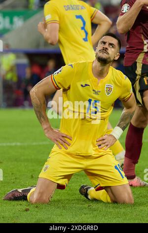 Köln, Deutschland. Juni 2024. Der rumänische Andrei Burca reagierte beim Gruppenspiel der UEFA Euro 2024 zwischen Belgien und Rumänien in Köln am 22. Juni 2024. Quelle: Meng Dingbo/Xinhua/Alamy Live News Stockfoto