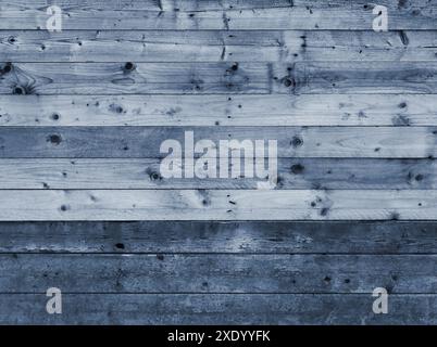 Alte rustikale Holzdiele Wand oder Boden mit blau gefärbten Brettern aus Holz Stockfoto