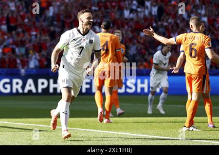 Berlin, Deutschland, 25. Juni 2024. Marko Arnautovic aus Österreich feiert das 0-1 während des Gruppenspiels der UEFA EURO 2024 zwischen den Niederlanden und Österreich im Olympiastadion am 25. Juni 2024 in Berlin. ANP MAURICE VAN STEEN/Alamy Live News/Alamy Live News/Alamy Live News Stockfoto