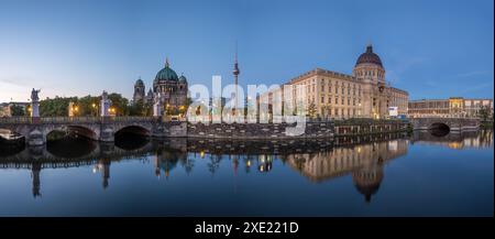 Panorama of the Berlin Cathedral, the famous TV Tower and the rebuilt City Palace at twilight Stock Photo