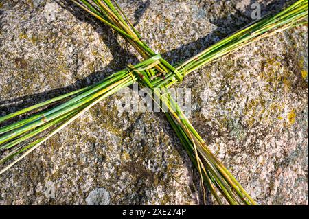 Saint Brigids Cross irisches heidnisches Symbol für Haus Segen Schutz vor Böse und Feuer. Traditionell hergestellt in Irland am ersten Tag der Spring St Stockfoto