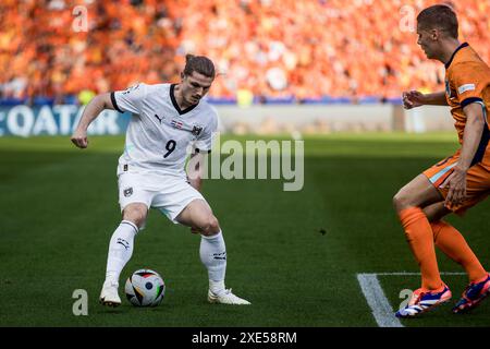 Berlin, Deutschland. Juni 2024. Marcel Sabitzer (9) aus Österreich war beim Spiel der UEFA Euro 2024 in der Gruppe D zwischen den Niederlanden und Österreich im Olympiastadion in Berlin zu sehen. Quelle: Gonzales Photo/Alamy Live News Stockfoto