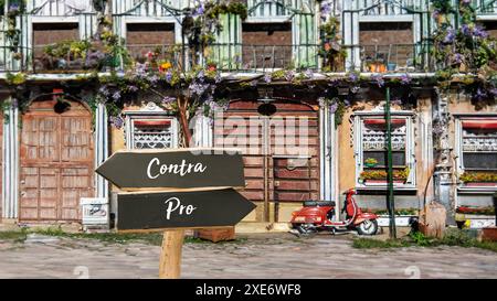 Wegweiser sind der direkte Weg zu vor- und Nachteilen Stockfoto