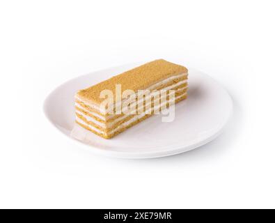 Napoleon schneidet Kuchen aus Blätterteig mit Sahne Stockfoto