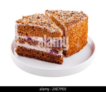 Hausgemachter Honigkuchen auf weißem Teller Stockfoto