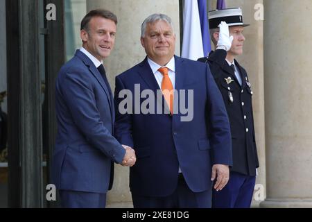 Paris, Frankreich, 26. juni 2024, Arbeitsessen zwischen dem französischen Präsidenten Emmanuel Macron und dem ungarischen Premierminister Viktor Orban. Credit Francois Loock/Alamy Live News Stockfoto