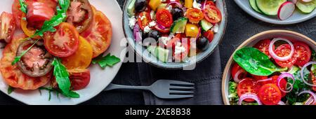 Panorama mit frischen vegetarischen Salaten, Flachbild-Lay-Shot von einer Auswahl Stockfoto