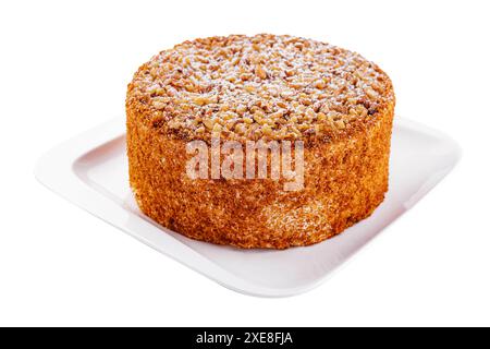 Hausgemachter Honigkuchen auf weißem Teller Stockfoto