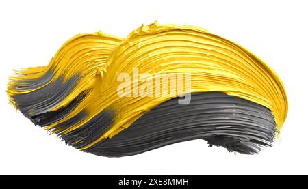 Schwarze und gelbe Farbstriche goldener Pinsel isoliert auf weißem Hintergrund Stockfoto