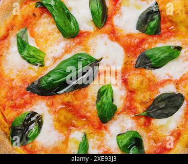 Pizza Margarita Nahaufnahme Hintergrund oder Textur Stockfoto