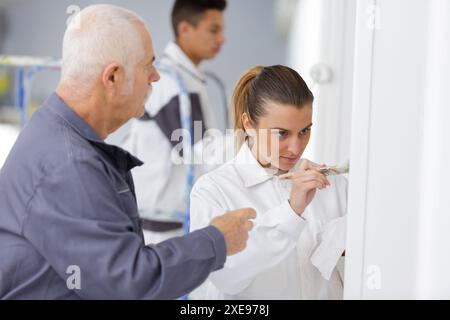 Mann und Frau professionelle Maler Stockfoto