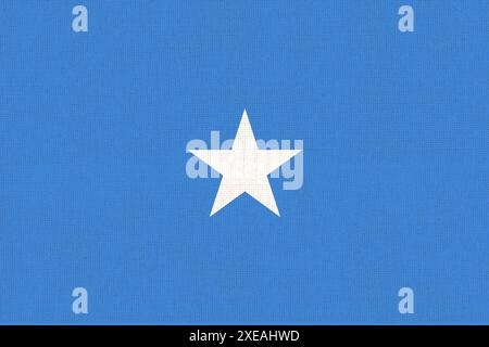 Flagge von Somalia. Somalische Flagge auf Stoffoberfläche. Stoffstruktur. Nationales Symbol. Bundesrepublik Stockfoto