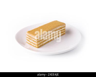 Napoleon schneidet Kuchen aus Blätterteig mit Sahne Stockfoto