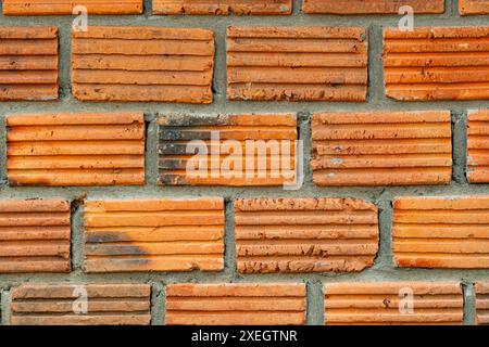 Nahaufnahme des alten grunge roten Backsteinhintergrunds. Stockfoto