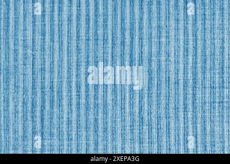 Ridge Textur Hintergrund aus Velours Cordblau Tuch. Großer gerippter, grober gewebter Samtstoff, gestreifter Polsterstoff, Möbeltextilien Stockfoto