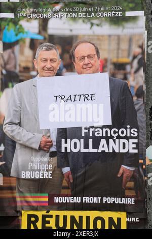 Corrèze, Frankreich. Juni 2024. Francois Hollande nannte einen „Verräter“. Der ehemalige Präsident der Französischen Republik ist Kandidat bei den Parlamentswahlen vom 30. Juni und 7. Juli 2024 in Corrèze. Hier wurde auf seinem Wahlplakat die Qualifikation „Verräter“ hinzugefügt. Francois Hollande ist Teil der Wahlkoalition „neue Volksfront“. Corrèze, Limousin, Frankreich, Europa. Foto: HM Images/Alamy Live News. Stockfoto