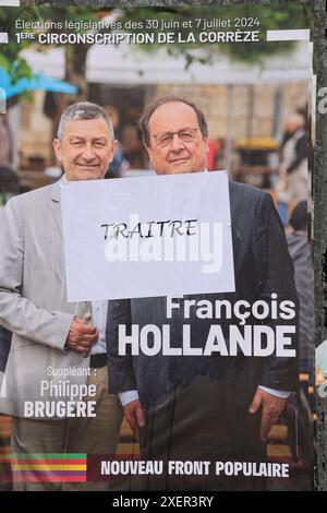 Corrèze, Frankreich. Juni 2024. Francois Hollande nannte einen „Verräter“. Der ehemalige Präsident der Französischen Republik ist Kandidat bei den Parlamentswahlen vom 30. Juni und 7. Juli 2024 in Corrèze. Hier wurde auf seinem Wahlplakat die Qualifikation „Verräter“ hinzugefügt. Francois Hollande ist Teil der Wahlkoalition „neue Volksfront“. Corrèze, Limousin, Frankreich, Europa. Foto: HM Images/Alamy Live News. Stockfoto