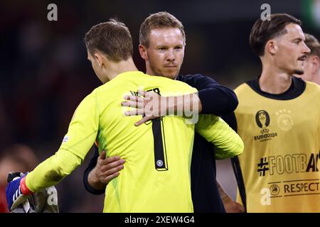 Dortmund - (l-r) deutscher Torhüter Manuel neuer, Deutschland-Trainer Julian Nagelsmann feierte den Sieg 2-0 nach dem Achtelfinale der UEFA EURO 2024 zwischen Deutschland und Dänemark am 29. Juni 2024 im BVB Stadion Dortmund. ANP | Hollandse Hoogte | MAURICE VAN STEEN Stockfoto