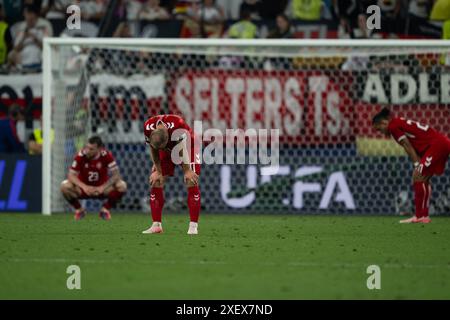 Dortmund, Deutschland. Juni 2024. Spieler Dänemarks reagieren auf das Achtelfinale der UEFA Euro 2024 zwischen Deutschland und Dänemark in Dortmund, Deutschland, 29. Juni 2024. Quelle: Xiao Yijiu/Xinhua/Alamy Live News Stockfoto