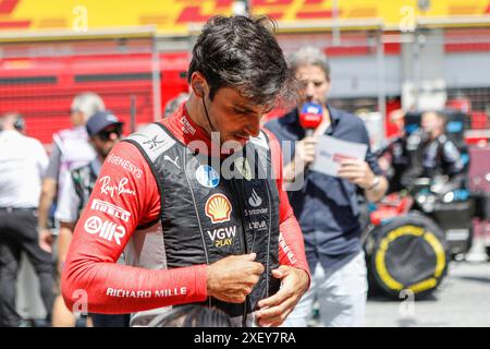 Spielberg, Österreich. Juni 2024. Formel 1 Quatar Airlines großer Preis von Österreich am Red Bull Ring, Österreich. Im Bild: Carlos Sainz (SPA) von Scuderia Ferrari vor dem Start des Sprints © Piotr Zajac/Alamy Live News Stockfoto