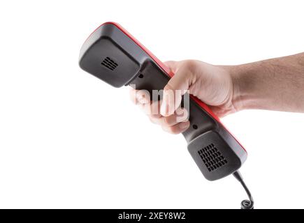 Hand mit schwarzem Retro-Telefonempfänger isoliert auf weißem Hintergrund mit Beschneidungspfad Stockfoto