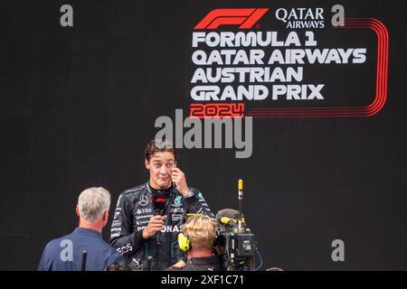 Spielberg, Österreich. 30. Juni 2024. SPIELBERG, ÖSTERREICH - JUNI 30: Interview mit dem Sieger George Russell aus Großbritannien und Mercedes beim Formel 1 Grand Prix von Österreich am 30. Juni 2024 in Spielberg, Österreich.240630 SEPA 19 116 - 20240630 PD11202 Credit: APA-PictureDesk/Alamy Live News Stockfoto